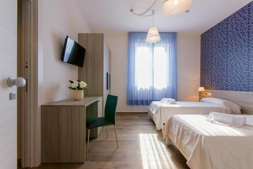 A bed or beds in a room at Zacapa B&B