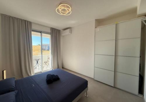 Postel nebo postele na pokoji v ubytování Sea & Pool Apartment