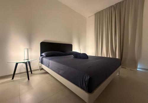 Postel nebo postele na pokoji v ubytování Sea & Pool Apartment