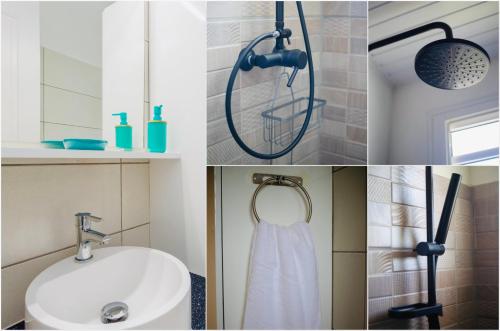 a shower head and a sink in a bathroom at Villa Tropic Hirondelle - Piscine Vue Mer in Le François