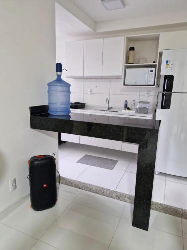 Una cocina o cocineta en Aconchego Baia do Pontal