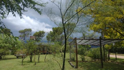 Κήπος έξω από το Cabaña en Villa Amancay