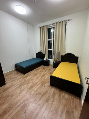 Кровать или кровати в номере City Tower 2BHK newly renovated 10 feb 2025