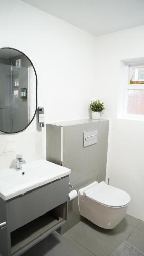 Ένα μπάνιο στο Mandeville Guest House