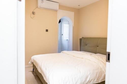 Llit o llits en una habitació de Aurora B&B