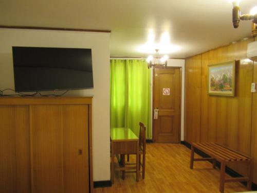 TV a/nebo společenská místnost v ubytování Hotel Vegas