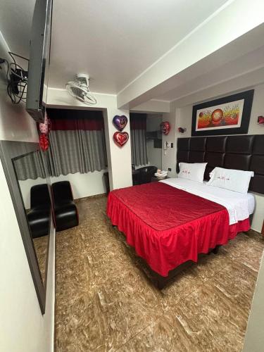 Una cama o camas en una habitación de Hospedaje W ISKAY