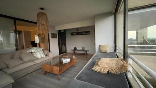 Гостиная зона в PUNTA FRAILE HAMACA SUITES Frente mar, 140 m2, amplias areas verdes, piscina, hamaca, tranquilidad