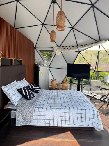 Postel nebo postele na pokoji v ubytování El Refugio Glamping