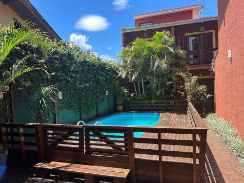 Bazén v ubytování Corais da Barra. Tranquilidade a 400 metros da beira da Praia da Barra nebo v jeho okolí