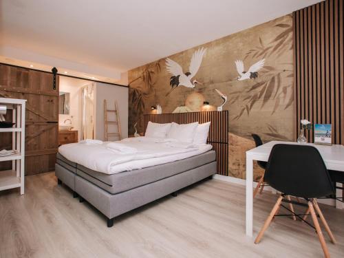 Postel nebo postele na pokoji v ubytování Casa del Mar Zandvoort