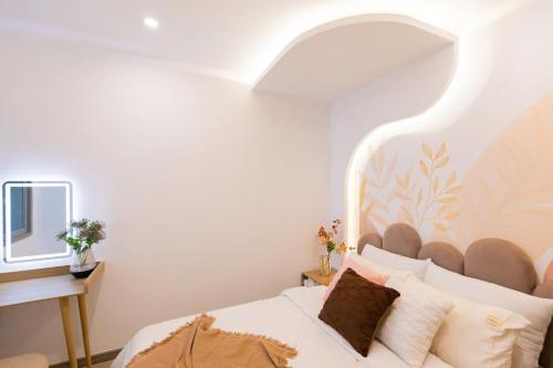 Postel nebo postele na pokoji v ubytování The Sóng Apartment 5 Stars Vung Tau - Căn Hộ Du Lịch Biển 5 Sao Vũng Tàu - MINH TOẢN's Homestay