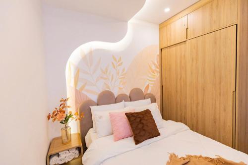 Postel nebo postele na pokoji v ubytování The Sóng Apartment 5 Stars Vung Tau - Căn Hộ Du Lịch Biển 5 Sao Vũng Tàu - MINH TOẢN's Homestay