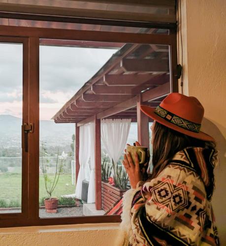 Foto dalla galleria di La Cabaña de Ciela con jacuzzi y minigolf a Latacunga
