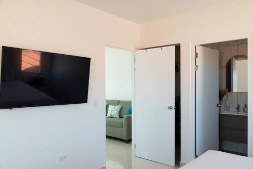 Телевизор и/или развлекательный центр в Beach Homes Aruba