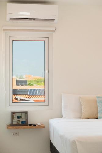 Кровать или кровати в номере Beach Homes Aruba
