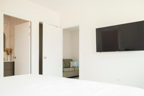 Телевизор и/или развлекательный центр в Beach Homes Aruba