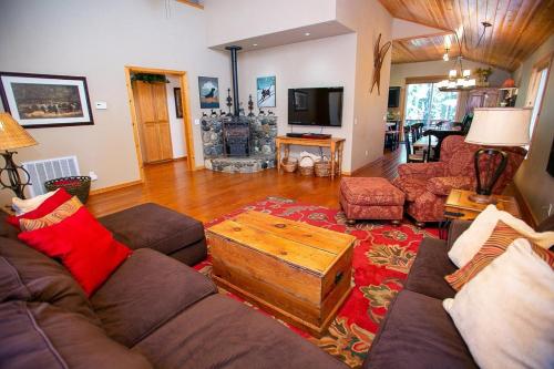 a living room with a couch and a coffee table at Cozy Tahoe Donner Retreat in Truckee