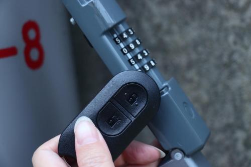 a person holding a cell phone in a case at NEWOPEN Villa lanikai in Kabira