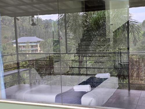 Balcon ou terrasse dans l'établissement Vythiri Hill Palace