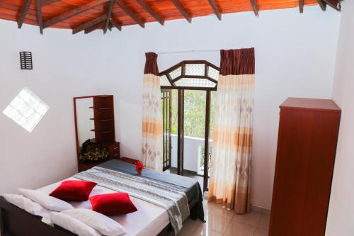 En eller flere senge i et værelse på Silver Dale Villa