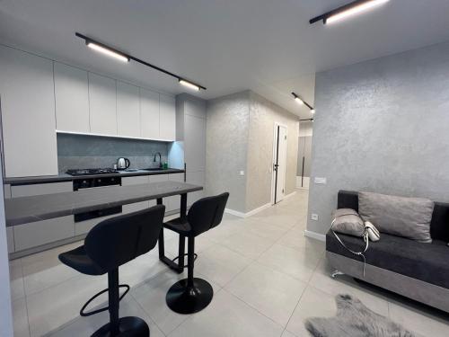 Телевизор и/или развлекательный центр в Apartments VIP AVALON