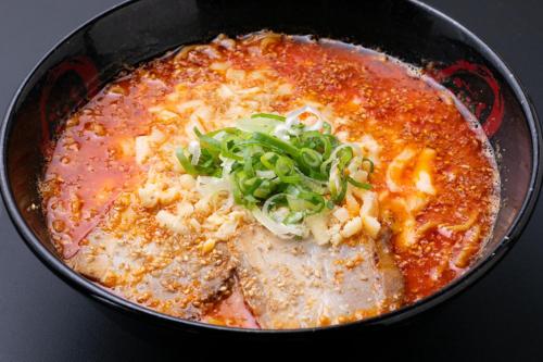 a pot of food with meat and vegetables in it at Yufuin Hotel Shuhokan in Yufuin