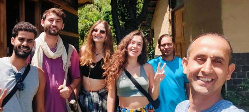 a group of people posing for a picture at Shantchit yoga and wellness in Kasol