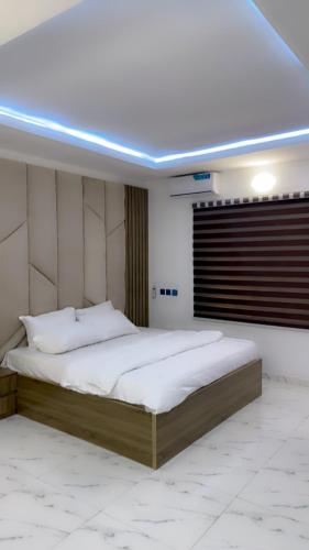Ένα ή περισσότερα κρεβάτια σε δωμάτιο στο City luxury