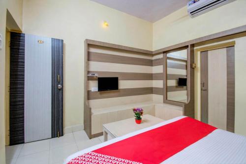 Postel nebo postele na pokoji v ubytování Hotel Neelam