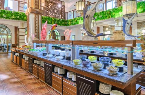 En restaurant eller et andet spisested på Noxinn Hotels Club Ultra All Inclusive