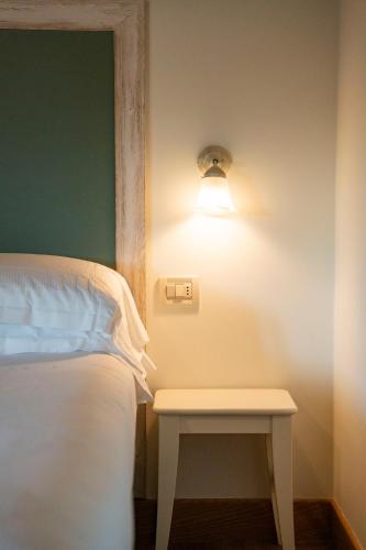 Una cama o camas en una habitación de Agriturismo Albafiorita