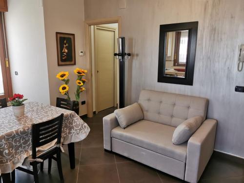 Ruang duduk di NSM Casa di Fulmine attico con box privato