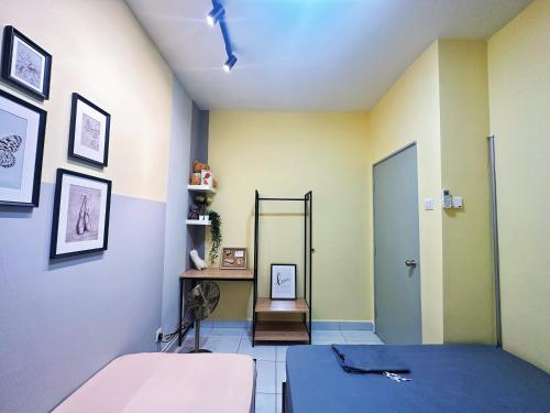 a room with a bed and a mirror at Cheap! 1-6pax Sunway Subang Mall & LRT Convenience in Subang Jaya