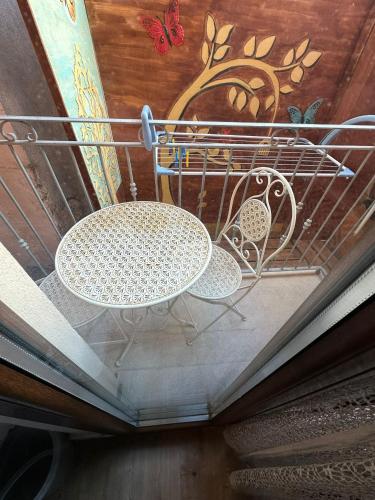 a shopping cart with a table on a ceiling at La Casa delle Rondini in Baunei