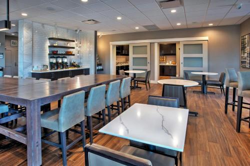 a dining room with tables and chairs at Residence Inn By Marriott Wichita Falls in Wichita Falls