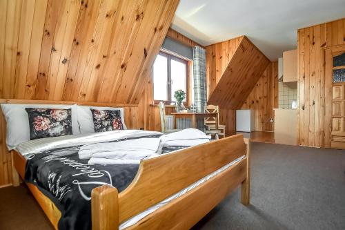 Ένα ή περισσότερα κρεβάτια σε δωμάτιο στο Tatra Slope & Spa