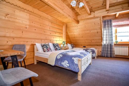 Ένα ή περισσότερα κρεβάτια σε δωμάτιο στο Tatra Slope & Spa