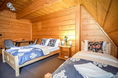 Ένα ή περισσότερα κρεβάτια σε δωμάτιο στο Tatra Slope & Spa