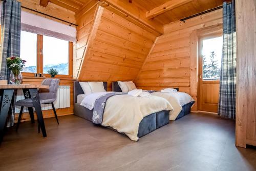 Ένα ή περισσότερα κρεβάτια σε δωμάτιο στο Tatra Slope & Spa