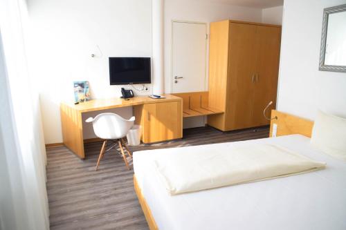 Postel nebo postele na pokoji v ubytování Cristall Hotel