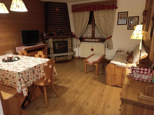 Posezení v ubytování La Casa Rossa - Presolana