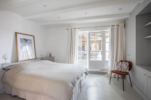 Giường trong phòng chung tại Ile de Re - 9 people - beach by foot - pool