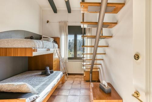 Postel nebo postele na pokoji v ubytování Can Maximino