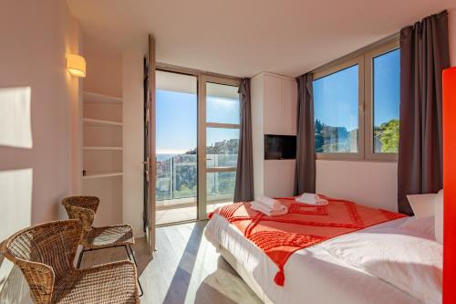 Postel nebo postele na pokoji v ubytování Villa des Issambres - Climatisée avec piscine