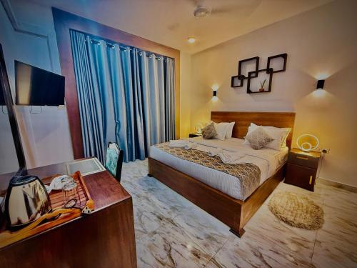 Cama o camas de una habitación en Aloe Transit Hotel
