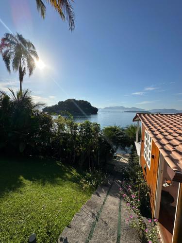 a view of the ocean from a house at Cabana do Mar in Angra dos Reis