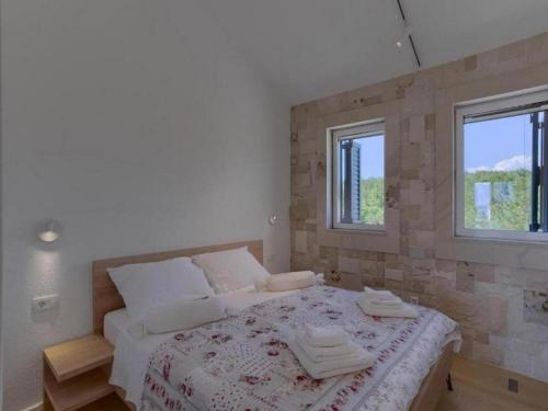 En eller flere senge i et værelse på Escape Villa Island Peaceful Oasis with Pool