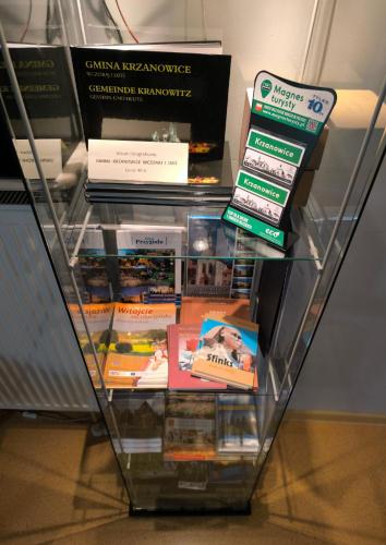 a display case with a bunch of books on it at Moravia in Krzanowice