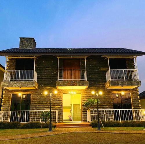 a house with lights in front of it at Soulmate Village in Hulu Langat